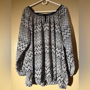 Preloved in great condition 
Lane Bryant long sleeved blouse size 22/24W